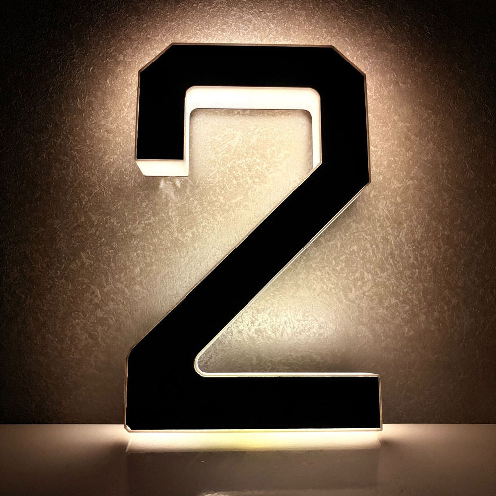 Solar-powered door sign light